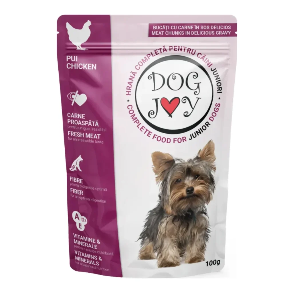 Plic de 100 g de hrană umedă pentru căței juniori Dog Joy cu pui în sos pentru talie XS-S.